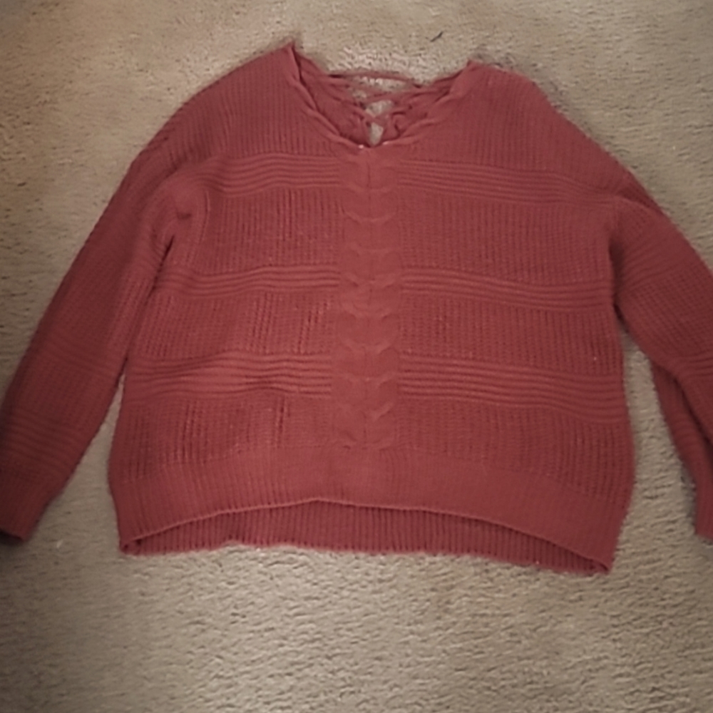 Cute sweater burnt orange color criss cross in back